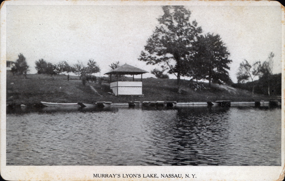 Historical Lyons Lake Postcard B&W photograph View of Murray's (from camps) Shows ice shed (now boat house) & boats Not Dated