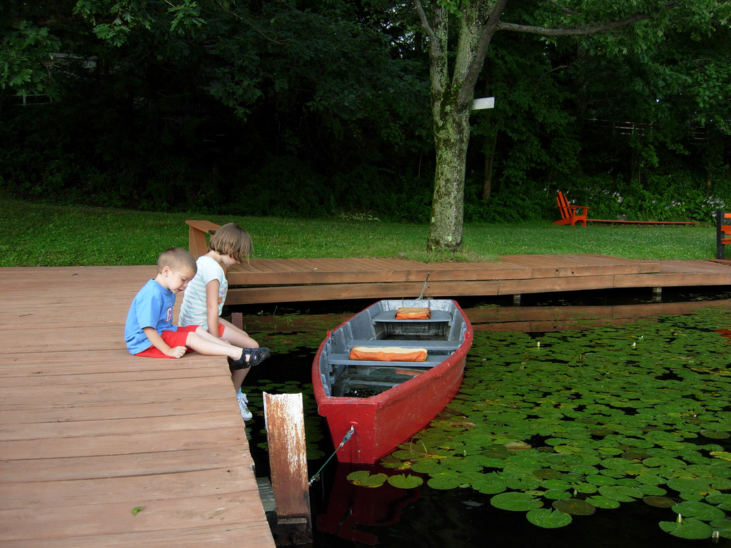 Lyons lake red wooden rowboat and cute kids